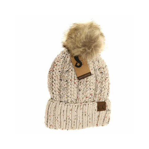 Knitted beanie with fur pom-pom and brand tag on a white background