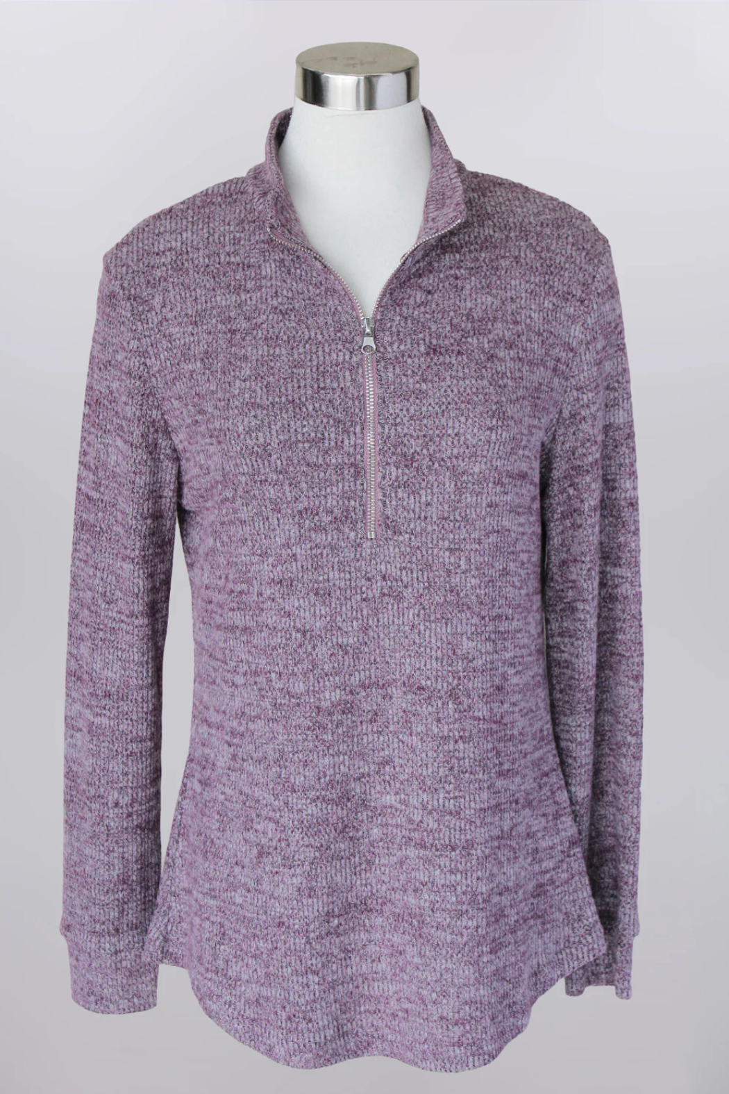 Purple marled sweater on a mannequin against a white background